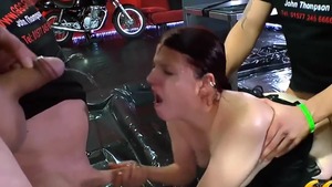 Tattooed & pierced redhead wearing heels fetish gangbang
