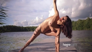 Solo skinny teen chick yoga outdoors