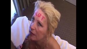 Glamour MILF sucking cock